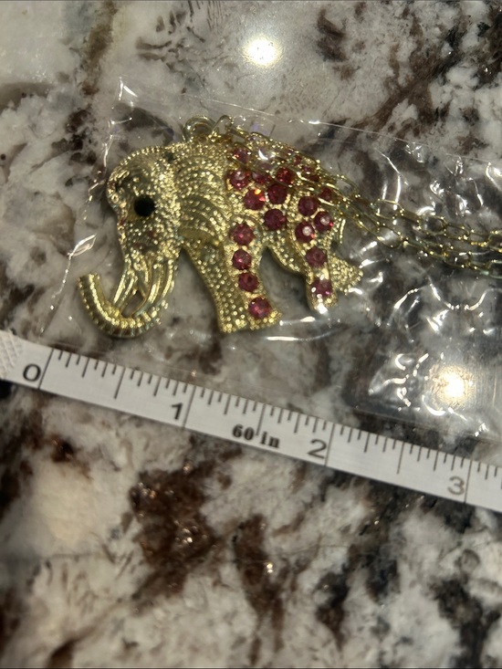 The Unbranded Brand Jewelry - Gold Elephant Pendant Necklace with Pink Accents